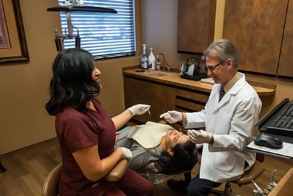 avondale-dentist-charlesclausendds-patient-dentistry-slide