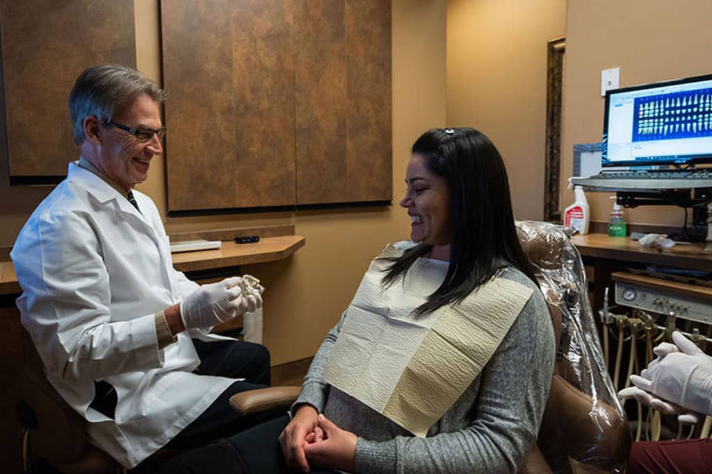 avondale-dentist-charlesclausendds-patient-exam-slide